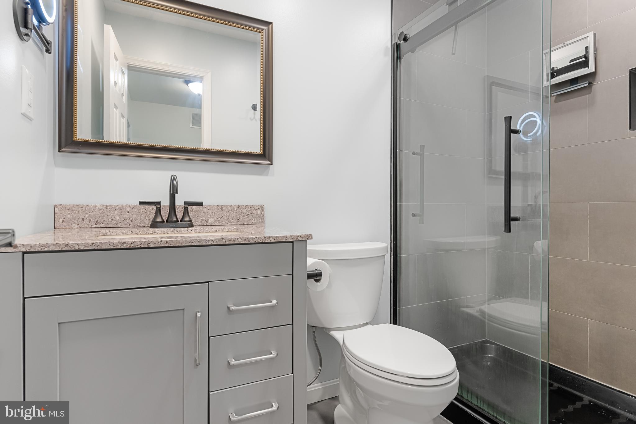 32 Ginger Drive Lumberton, NJ 08048 - Photo 24 of 31 a bathroom with a granite countertop toilet sink and mirror