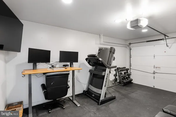 a view of a workspace with furniture