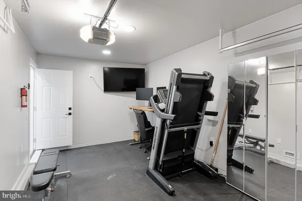 a view of a room with gym equipment