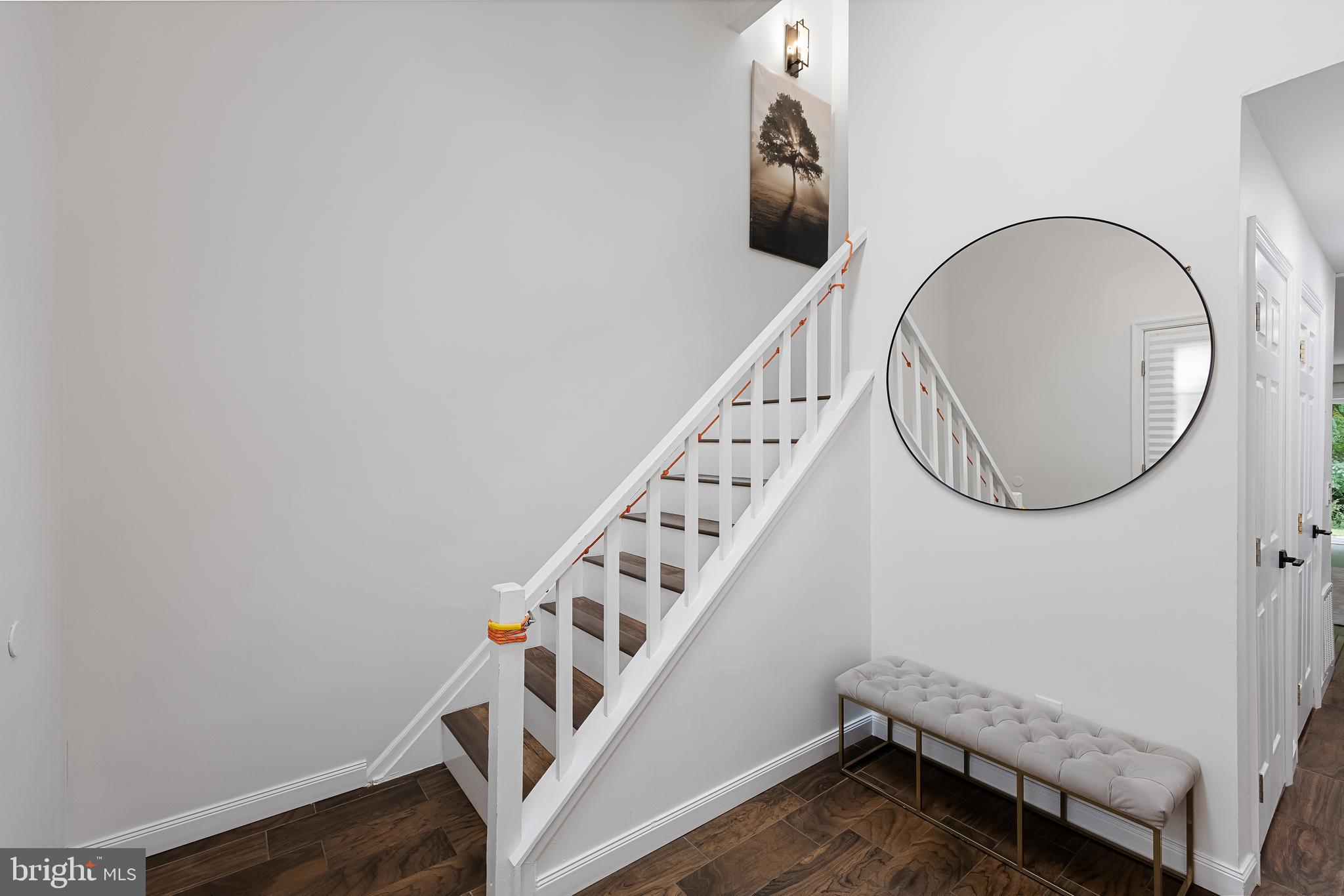 32 Ginger Drive Lumberton, NJ 08048 - Photo 4 of 31 a view of a livingroom with wooden floor and stairs
