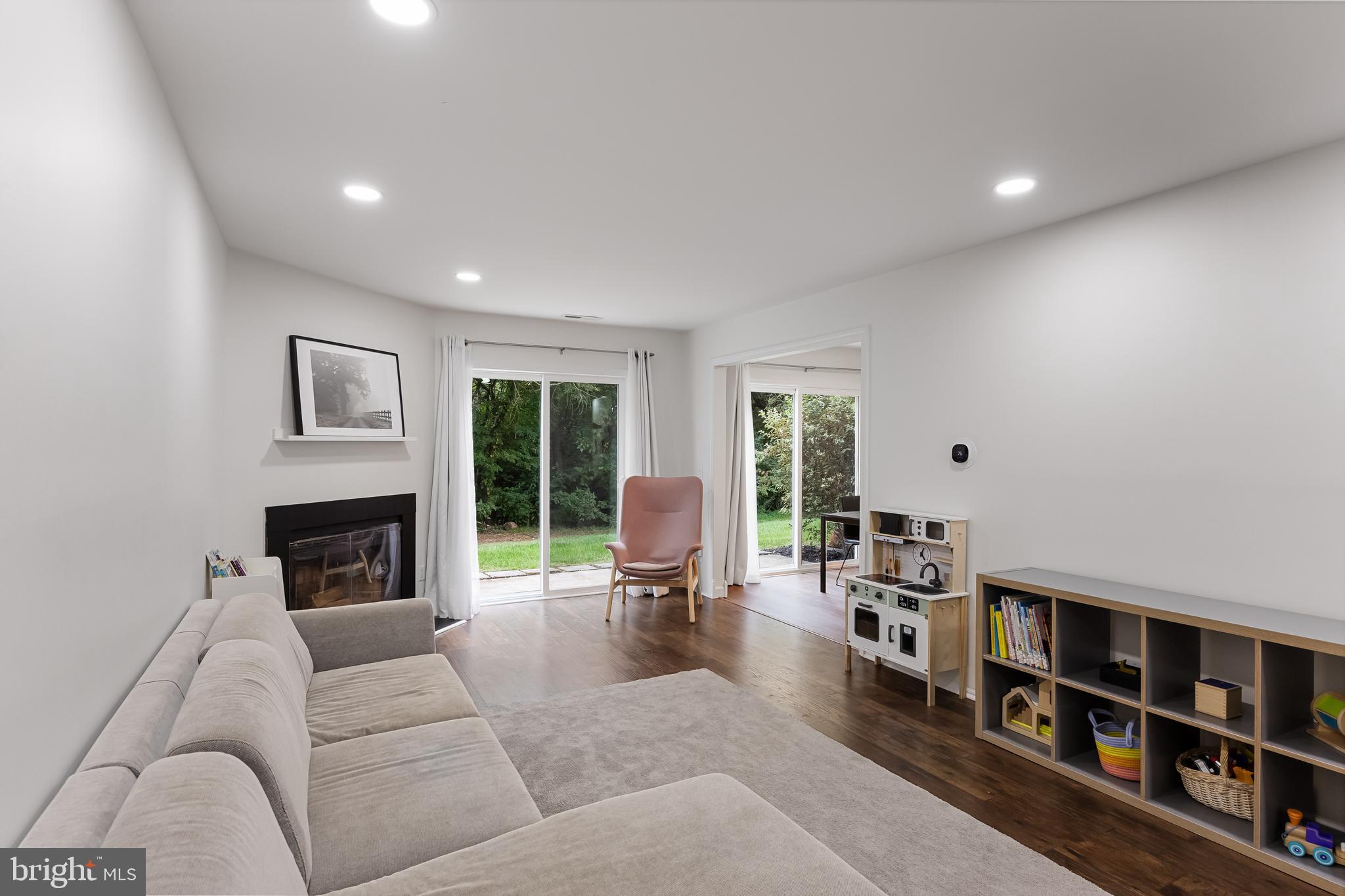 32 Ginger Drive Lumberton, NJ 08048 - Photo 7 of 31 a living room with furniture fireplace and book shelf