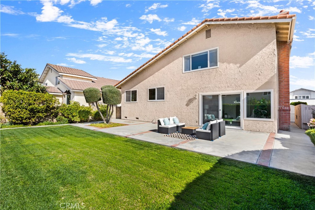 3572 Myrtle Street Irvine, CA 92606 - Photo 3 of 3 a view of a house with backyard sitting area and garden
