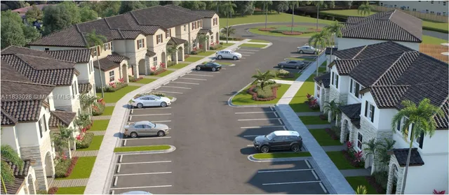 an aerial view of a house with swimming pool