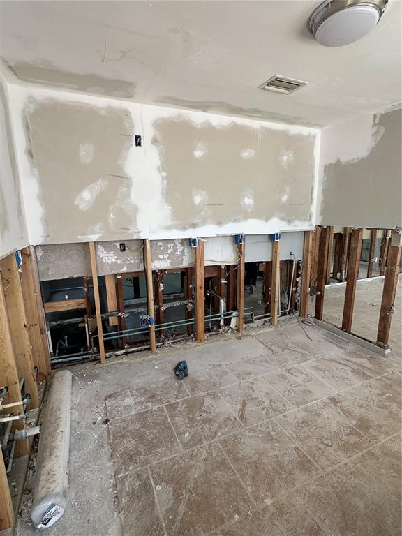 13434 1st Street East Madeira Beach, FL 33708 - Photo 10 of 15 a view of a room with gym equipment