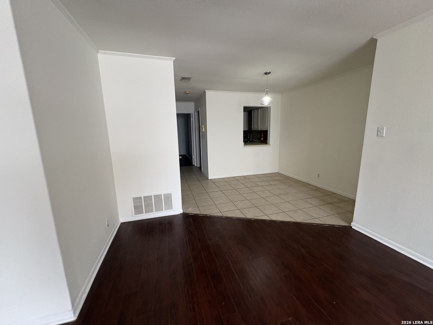7738 Chambers Road, Unit 1101 San Antonio, TX 78229 - Photo 20 of 35 wooden floor in an empty room