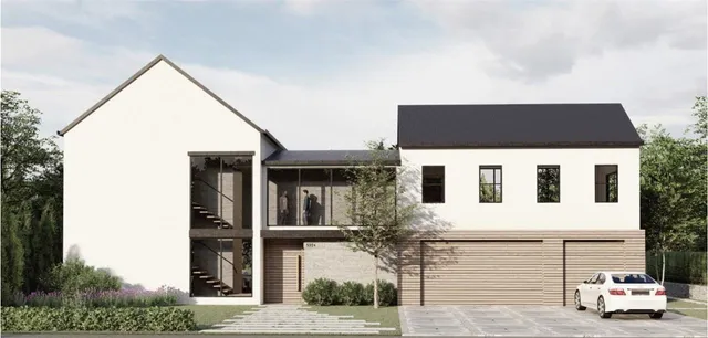 a front view of a house with a garage