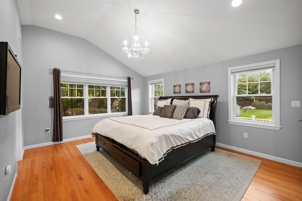 6 Alderbrook Road Andover, MA 01810 - Photo 12 of 29 a bed sitting in a bedroom next to a window