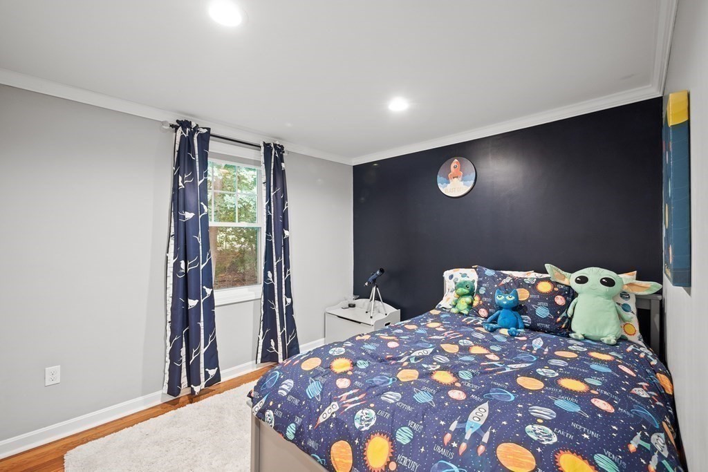 6 Alderbrook Road Andover, MA 01810 - Photo 18 of 29 a bedroom with a bed and a table