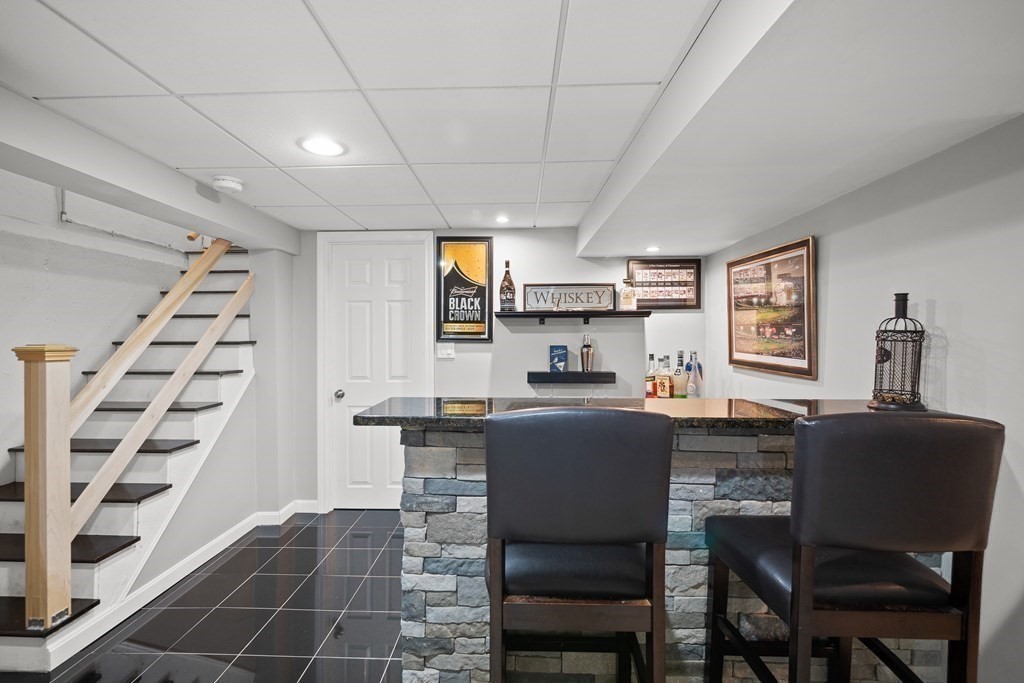 6 Alderbrook Road Andover, MA 01810 - Photo 20 of 29 a dining room with furniture and wooden floor