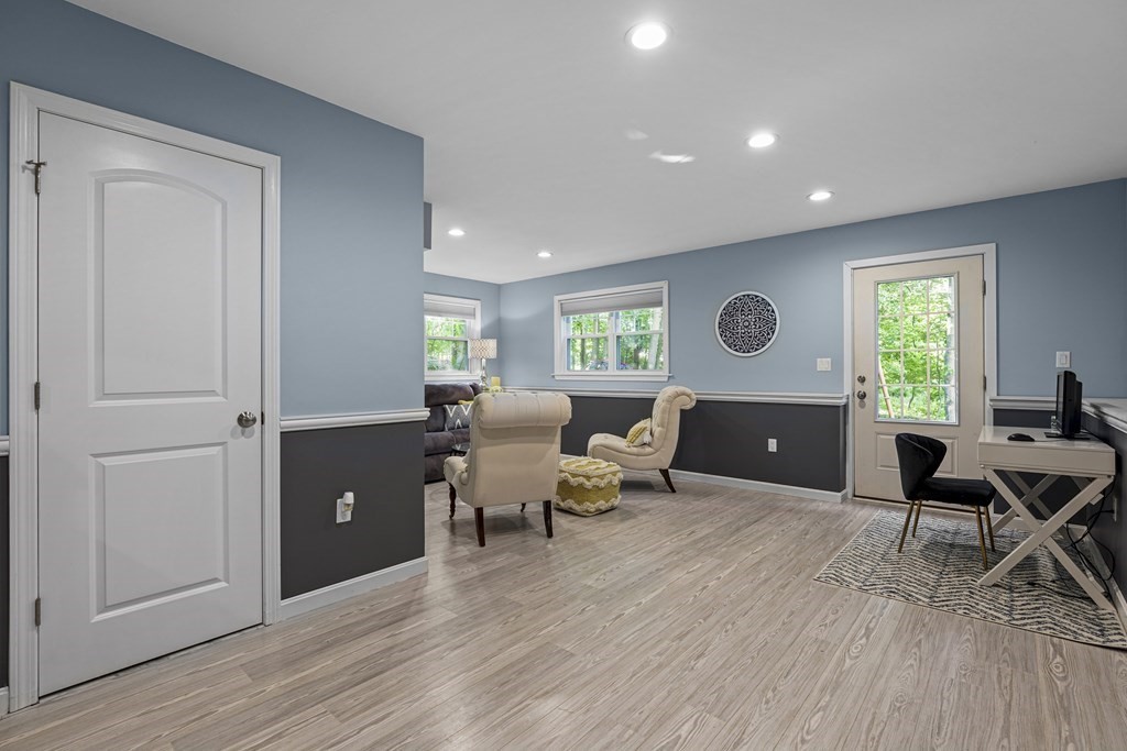 6 Alderbrook Road Andover, MA 01810 - Photo 24 of 29 a living room with furniture and a wooden floor