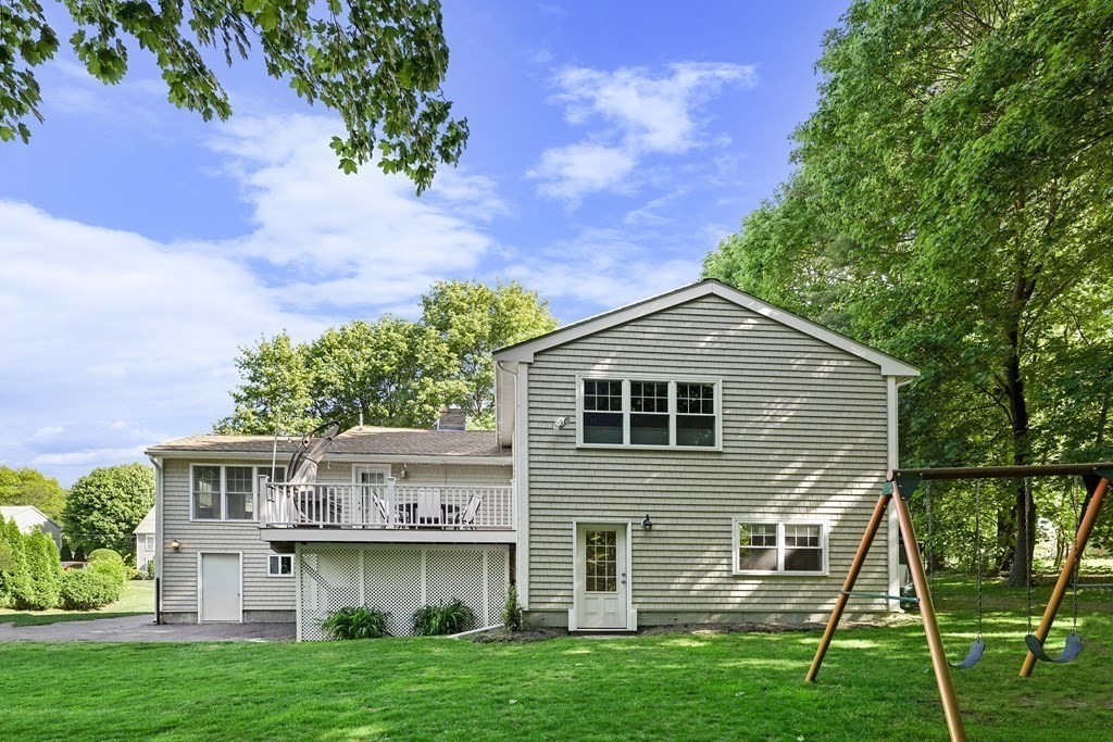 6 Alderbrook Road Andover, MA 01810 - Photo 27 of 29 a front view of a house with a yard