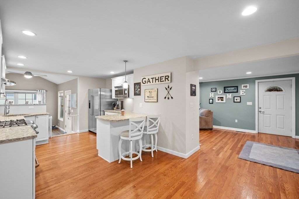 6 Alderbrook Road Andover, MA 01810 - Photo 3 of 29 a living room with furniture and a wooden floor
