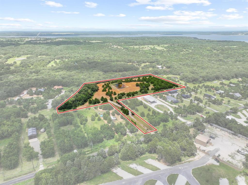 1445 Cedar Mills Road Gordonville, TX 76245 - Photo 10 of 28 Expansive land parcel featuring a mix of open terrain and mature trees