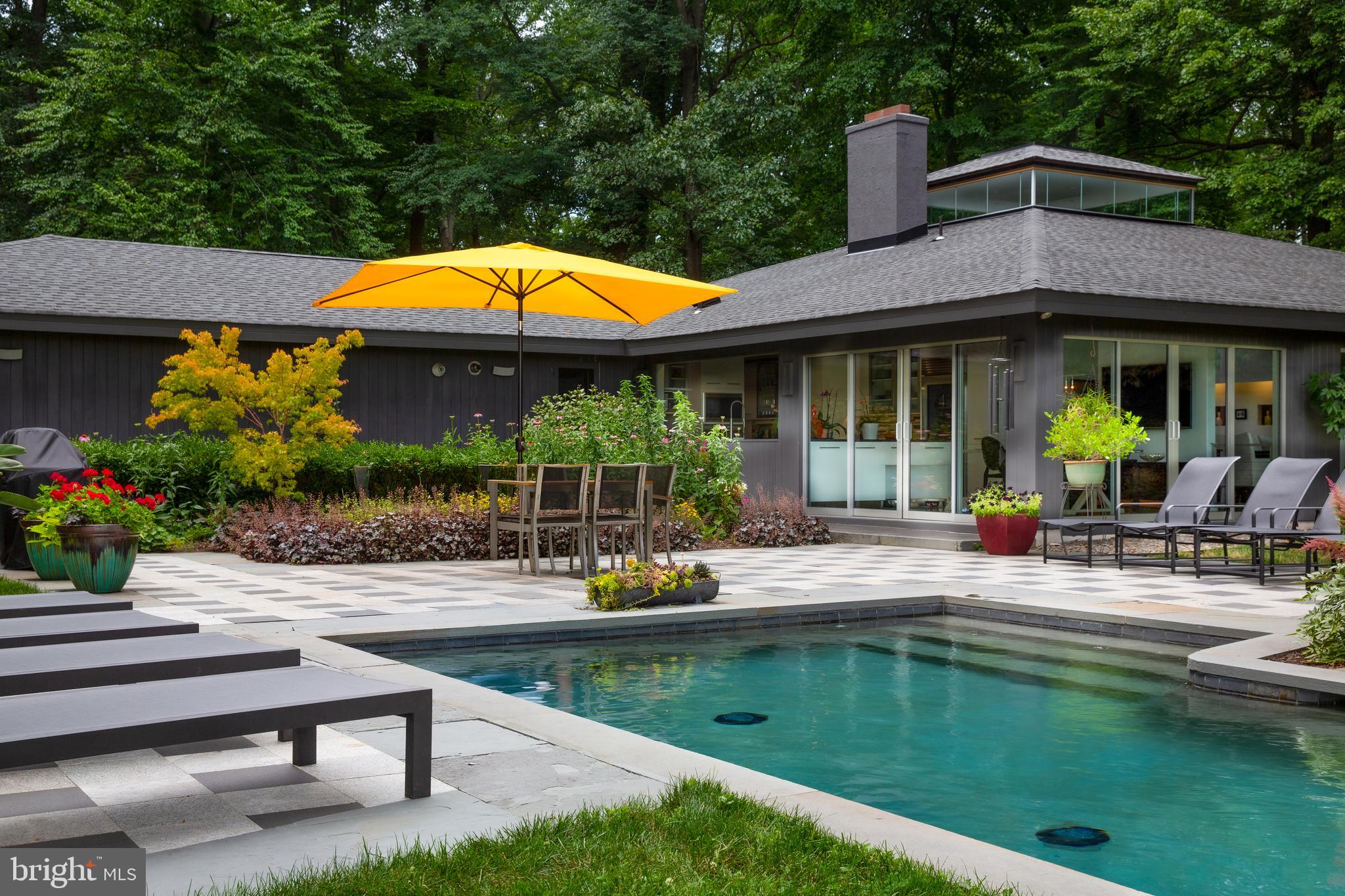 35 Raven Rock Rosemont Road Stockton, NJ 08559 - Photo 30 of 61 a view of a house with pool and chairs