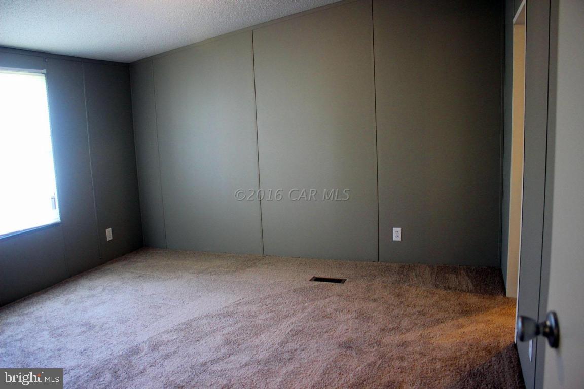 10841 Oriole Back Road Princess Anne, MD 21853 - Photo 4 of 12 an empty room with closet