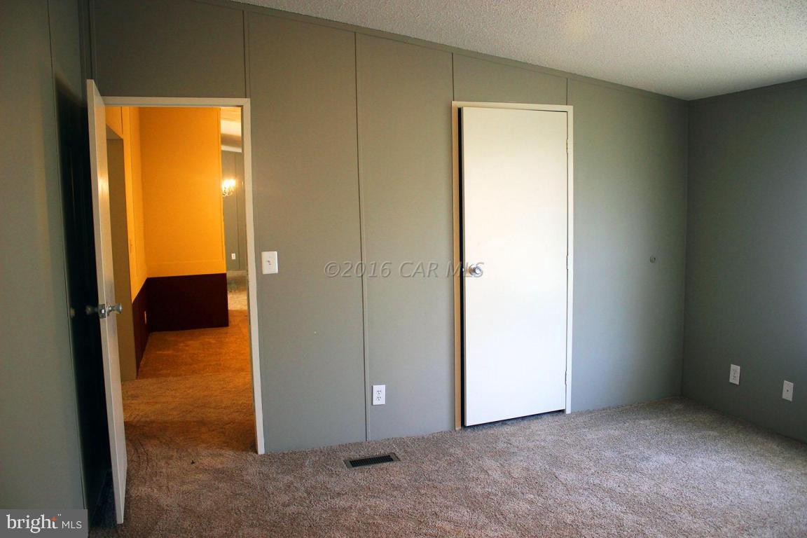 10841 Oriole Back Road Princess Anne, MD 21853 - Photo 5 of 12 an empty room with windows