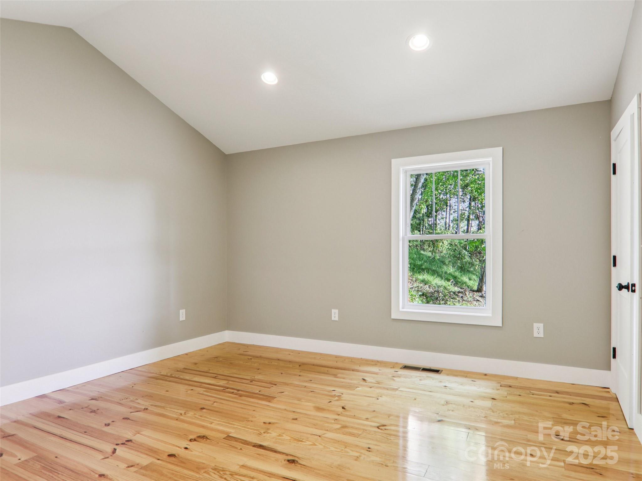 366 Ben Nevis Road Brevard, NC 28712 - Photo 21 of 48 a view of an empty room and window