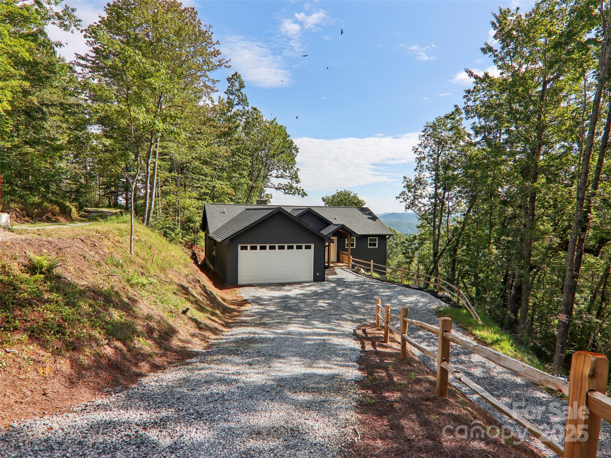 366 Ben Nevis Road Brevard, NC 28712 - Photo 3 of 48 a view of a house with a yard