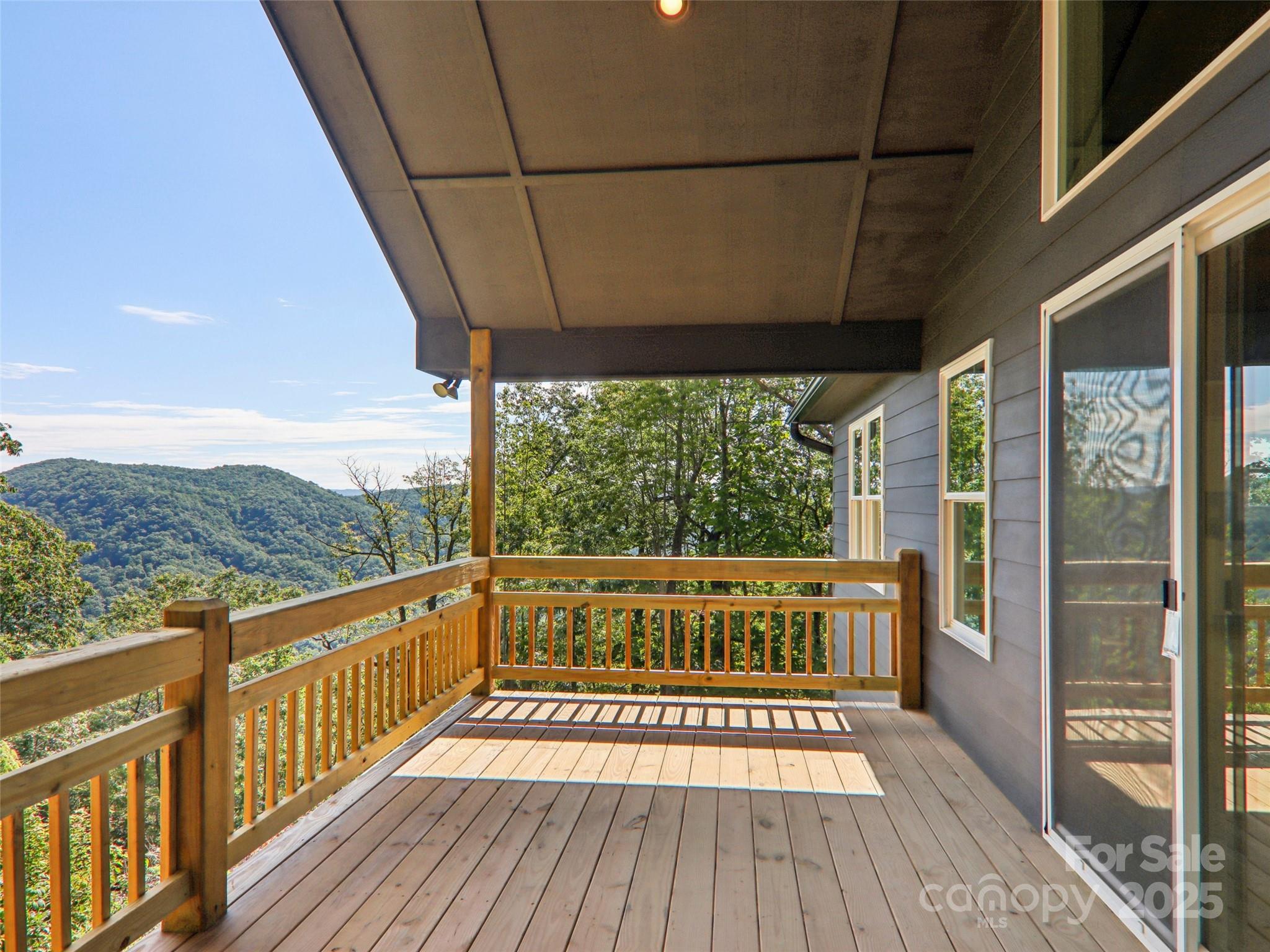 366 Ben Nevis Road Brevard, NC 28712 - Photo 38 of 48 a view of a balcony with wooden floor