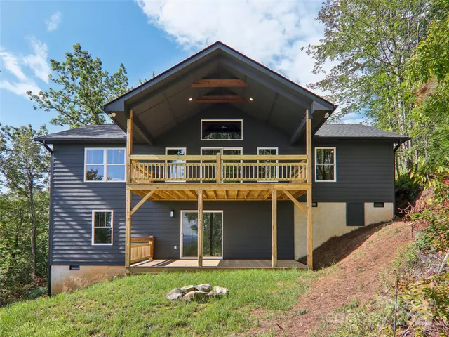 a view of a city with lush green forest