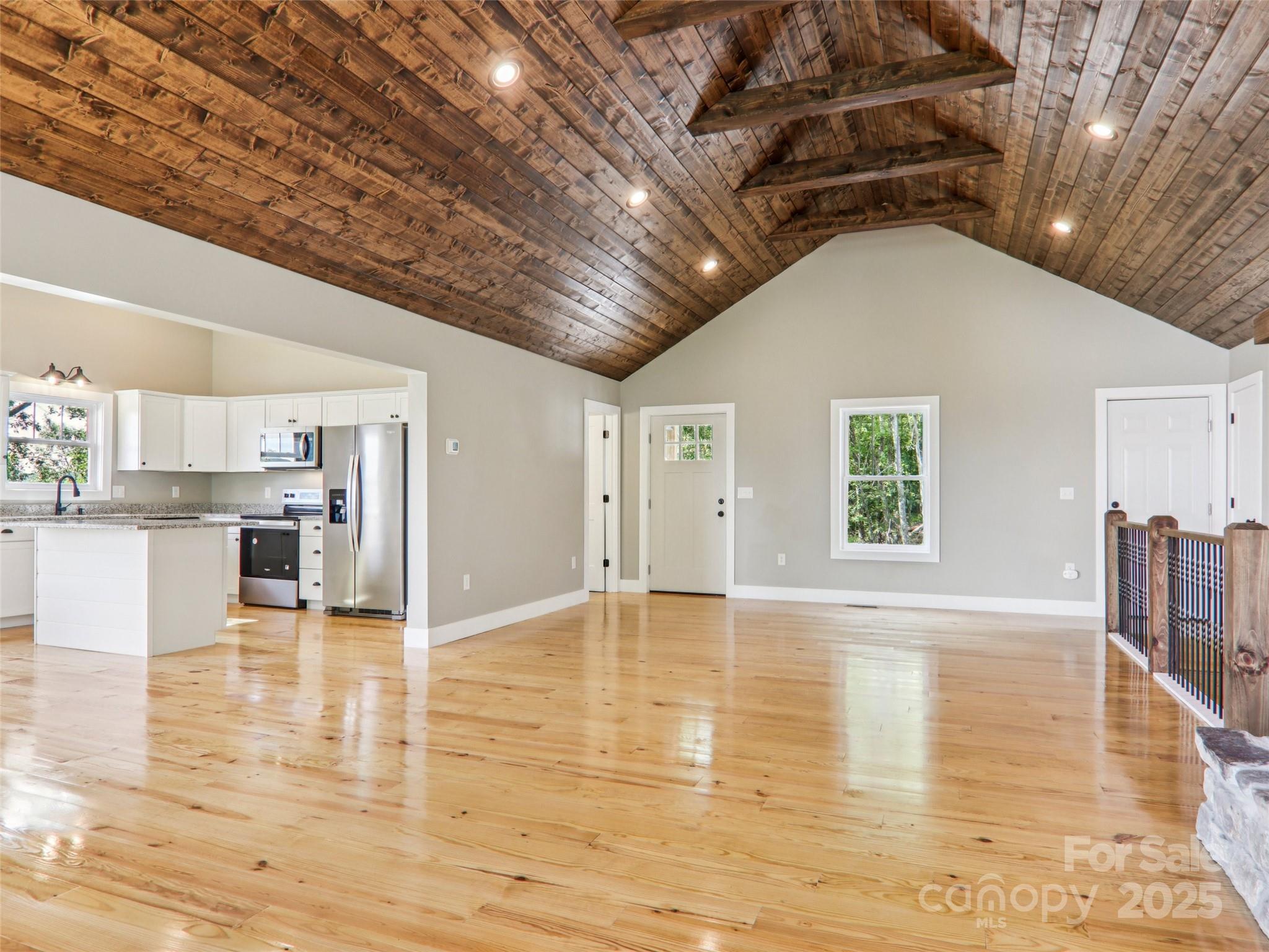 366 Ben Nevis Road Brevard, NC 28712 - Photo 6 of 48 a view of empty room with wooden floor