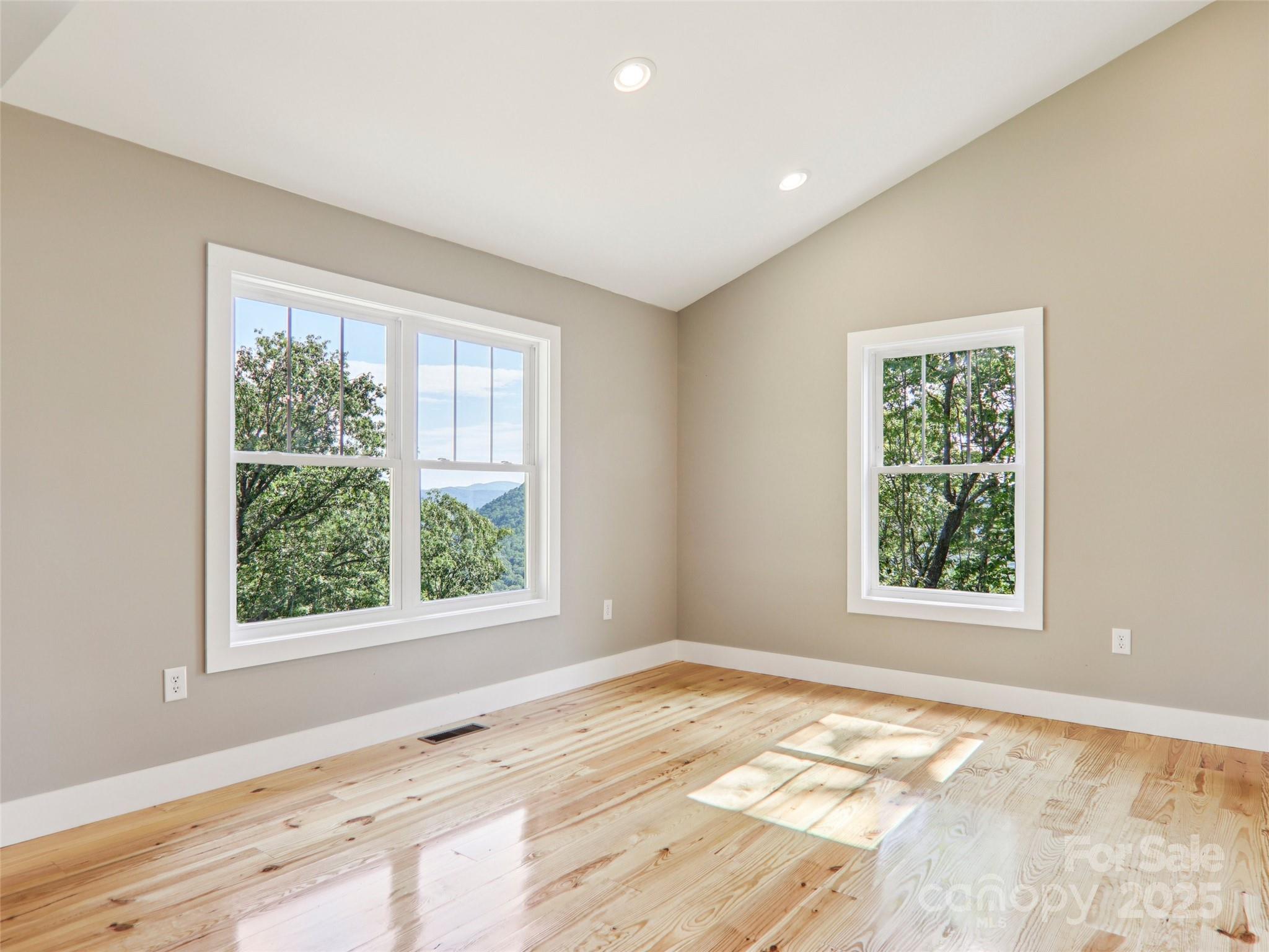 366 Ben Nevis Road Brevard, NC 28712 - Photo 10 of 48 a view of an empty room and window