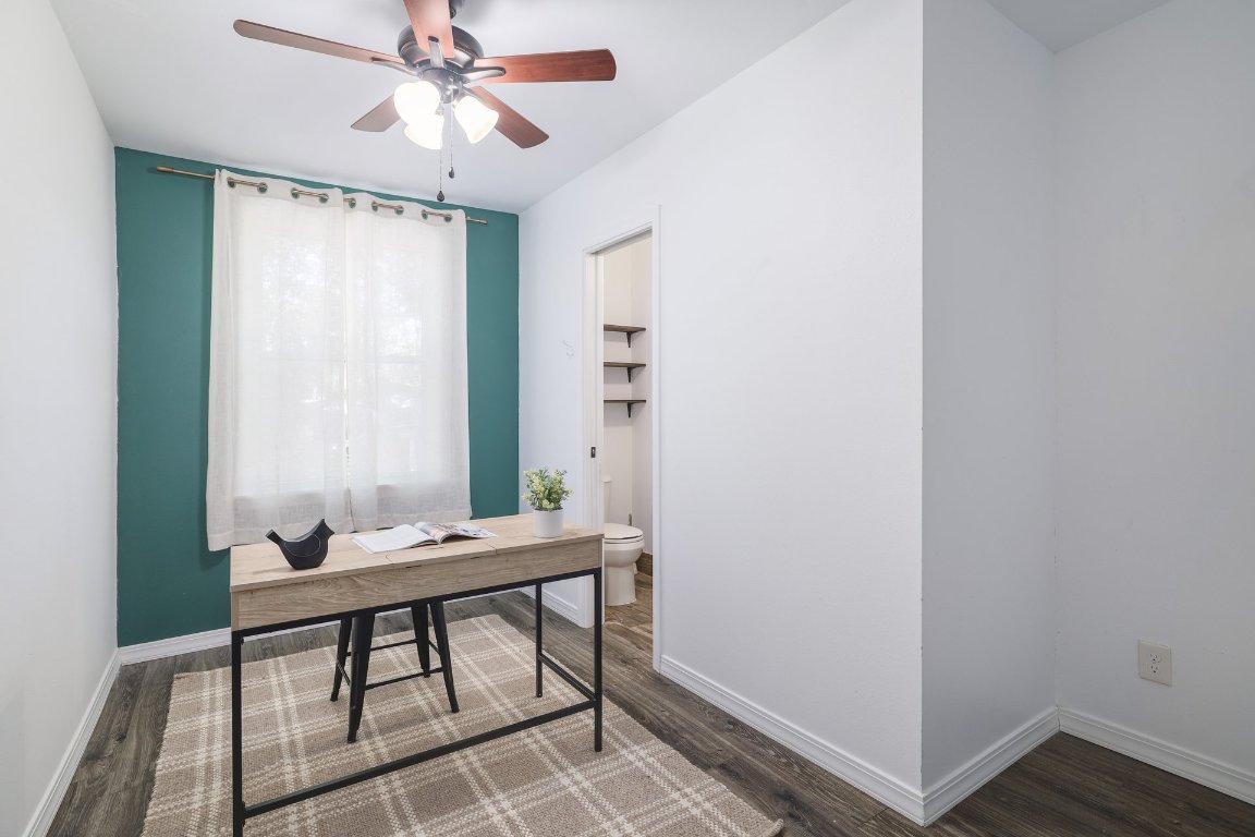 6511 Chesterfield Avenue Austin, TX 78752 - Photo 12 of 27 a room with a table and chairs