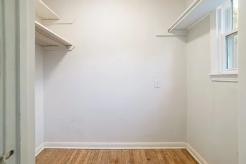 a view of small space with racks on the wall