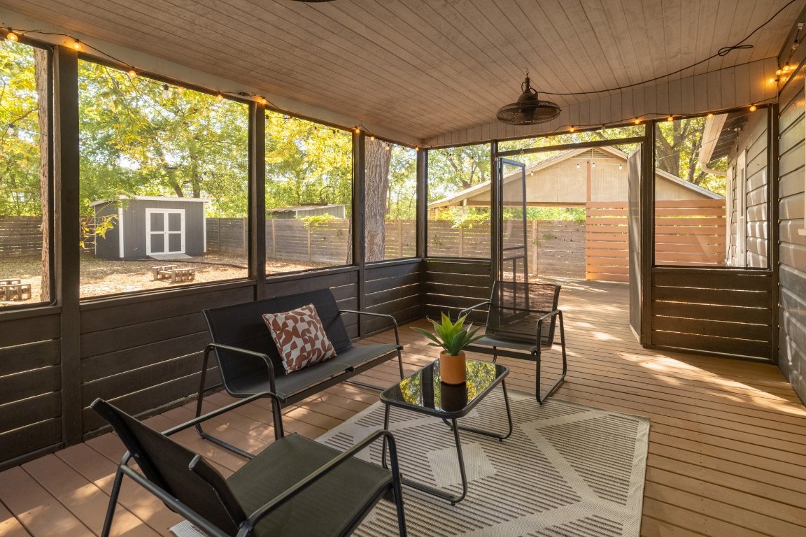 6511 Chesterfield Avenue Austin, TX 78752 - Photo 20 of 27 a view of a living room with furniture and wooden floor