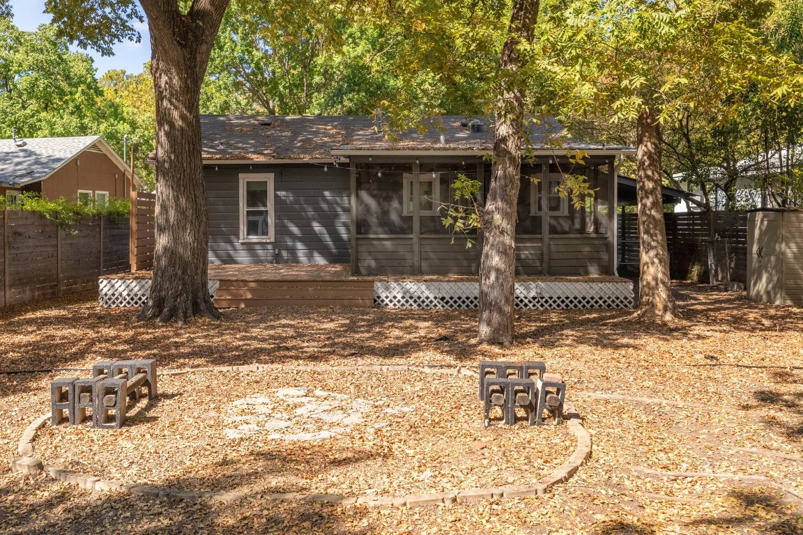 6511 Chesterfield Avenue Austin, TX 78752 - Photo 24 of 27 a front view of a house with a yard