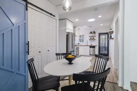 a view of a dining room with furniture