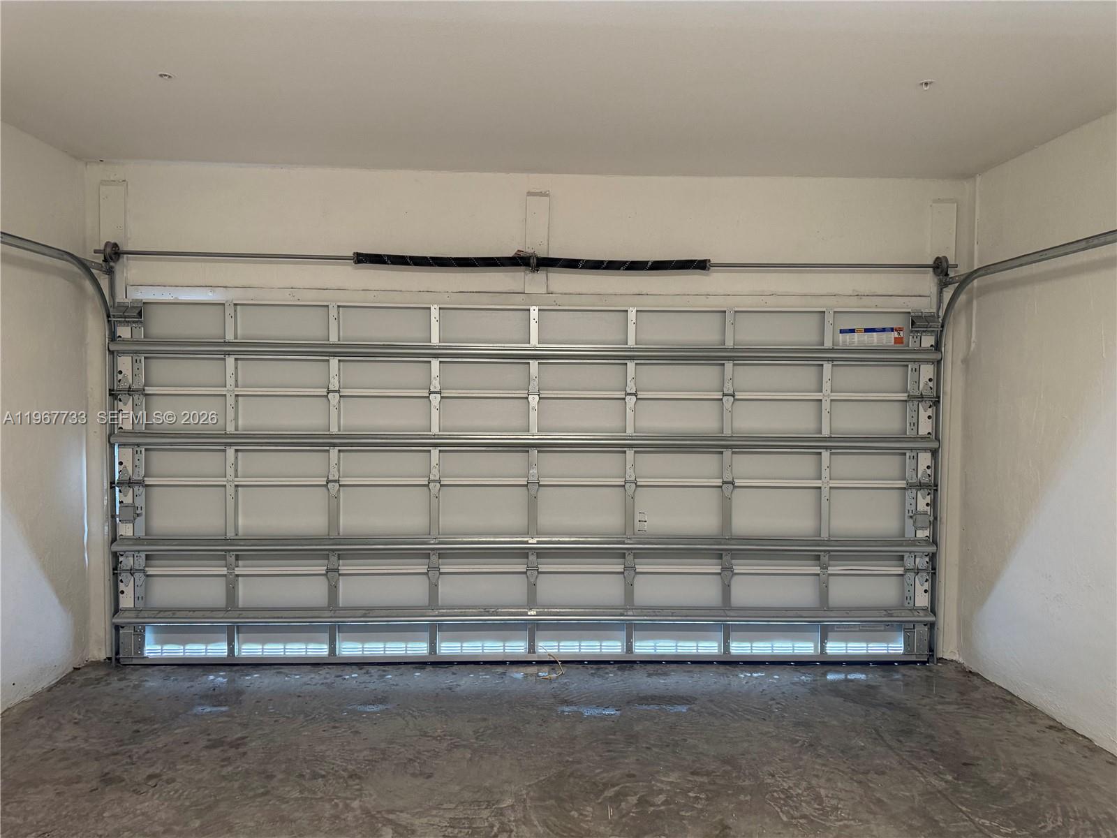 12420 Southwest 248th Street, Unit 7 Homestead, FL 33032 - Photo 9 of 31 a view of a room with racks