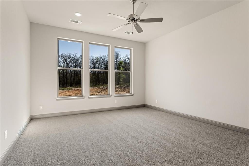 131 Spring Valley Road Paradise, TX 76073 - Photo 17 of 40 a view of an empty room with a window