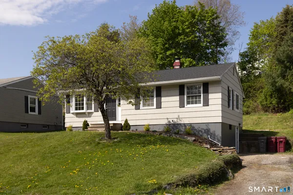 a house view with a garden space