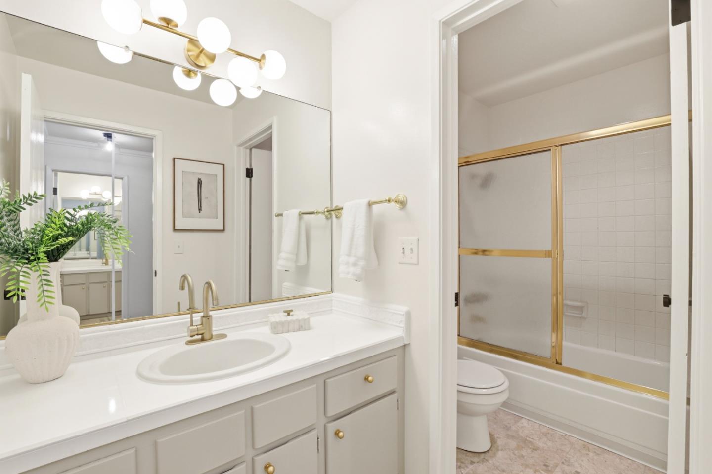 100 East Middlefield Road, Unit 3B Mountain View, CA 94043 - Photo 14 of 32 a bathroom with a sink a toilet and shower