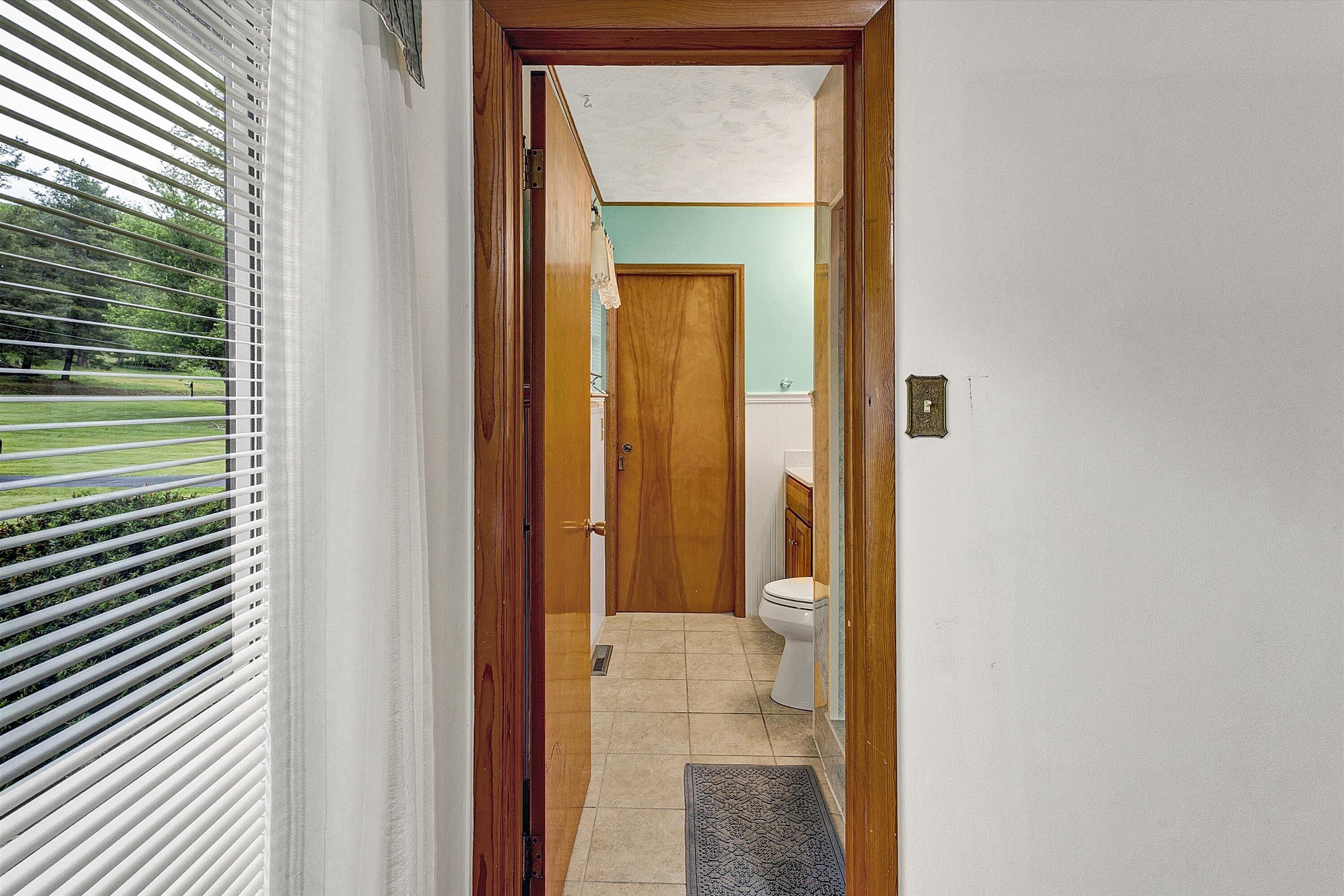 2015 Evergreen Road Covington, VA 24426 - Photo 26 of 46 a view of a bathroom from a hallway