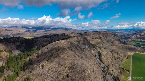a view of a backyard of a house