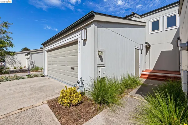 a view of a back yard of the house