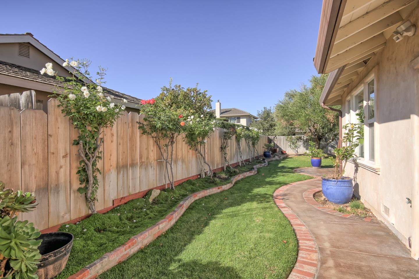22305 Montera Drive Salinas, CA 93908 - Photo 16 of 20 a view of a backyard with potted plants