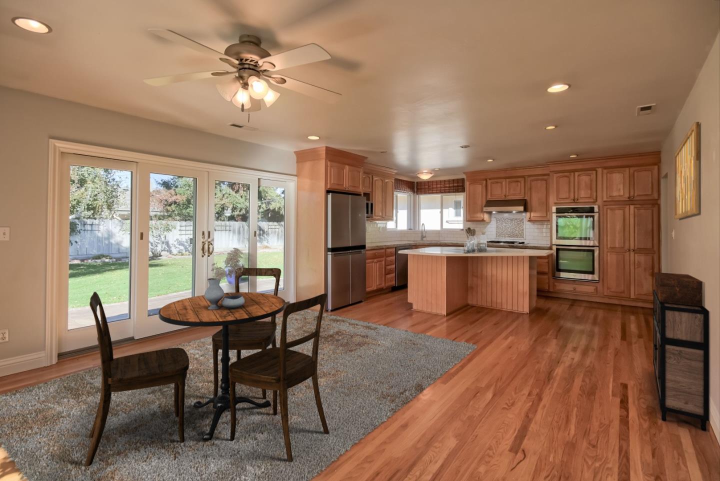 22305 Montera Drive Salinas, CA 93908 - Photo 6 of 20 a living room with stainless steel appliances kitchen island granite countertop furniture and a kitchen view