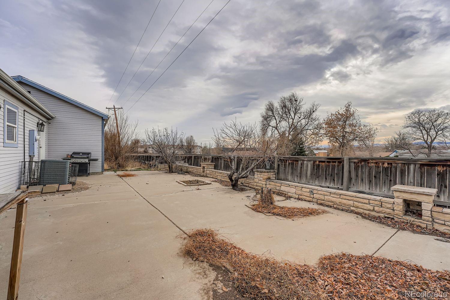 7393 Raleigh Street Westminster, CO 80030 - Photo 21 of 22 a view of a terrace with chairs