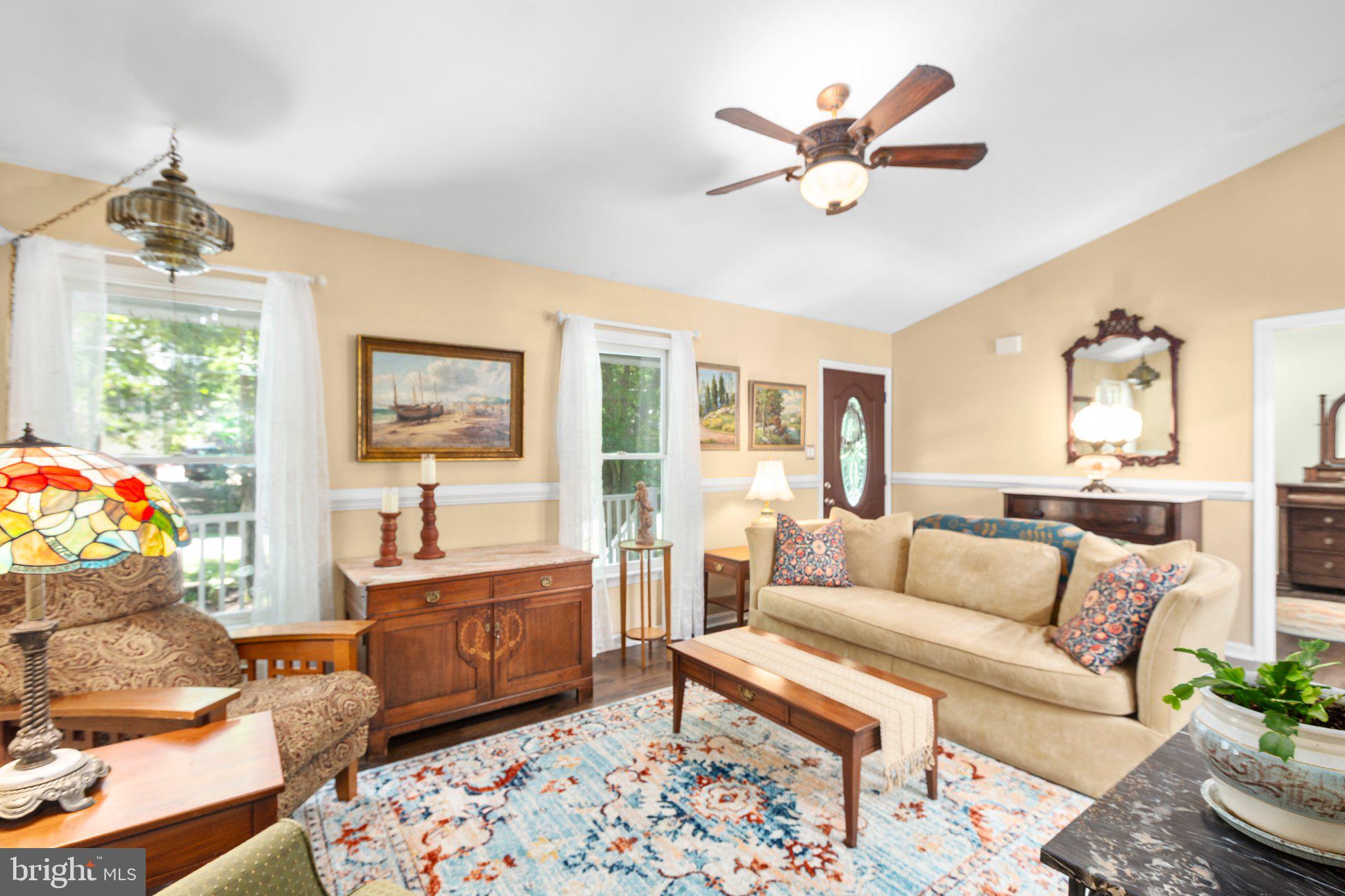 228 Cedar Ridge Drive Ruther Glen, VA 22546 - Photo 17 of 77 a living room with furniture and a large window