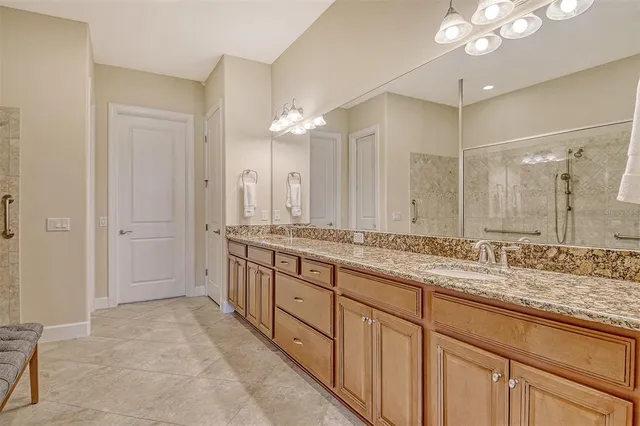 an aerial view of a house with a ocean view