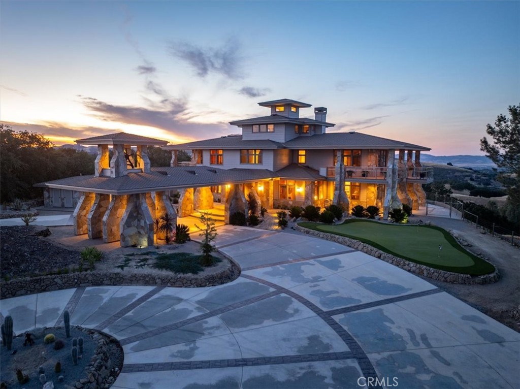 76346 Bryson Hesperia Road Bradley, CA 93426 - Photo 1 of 58 a view of a big building with fountain in front of it