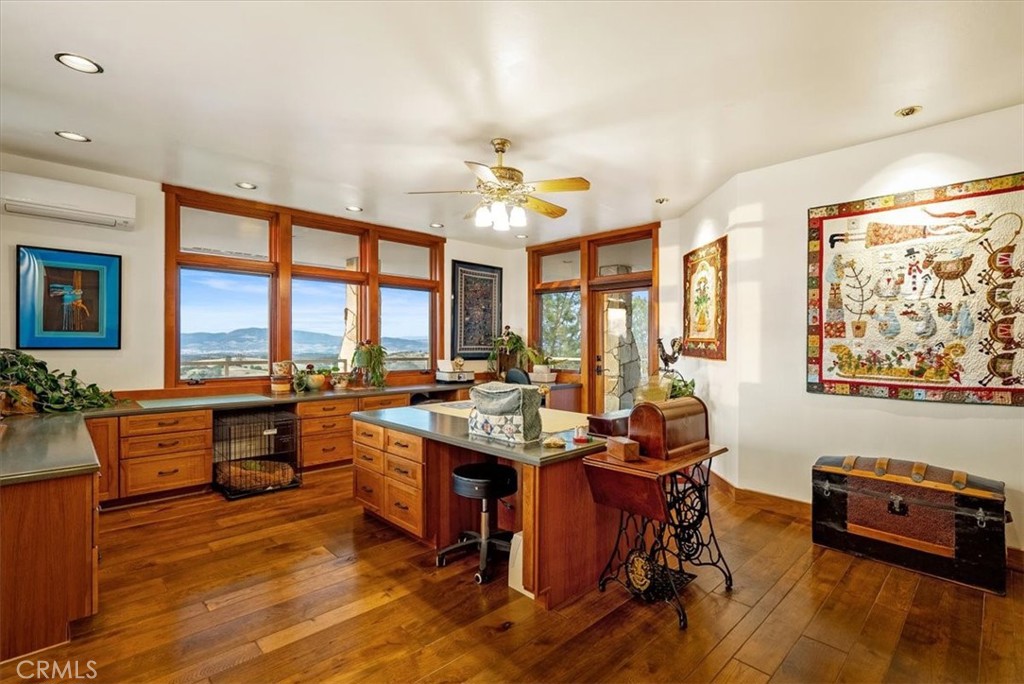 76346 Bryson Hesperia Road Bradley, CA 93426 - Photo 30 of 58 a very nice looking living room with a large window and kitchen view