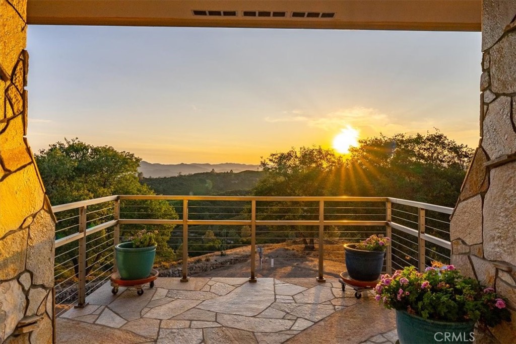 76346 Bryson Hesperia Road Bradley, CA 93426 - Photo 36 of 58 a view of a terrace with a potted plant