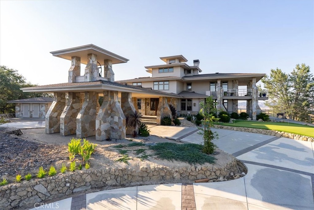 76346 Bryson Hesperia Road Bradley, CA 93426 - Photo 44 of 58 a front view of a house with garden