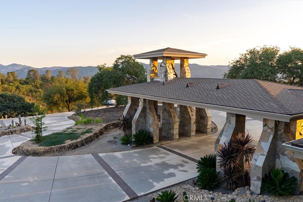 76346 Bryson Hesperia Road Bradley, CA 93426 - Photo 50 of 58 a backyard of a house with table and chairs