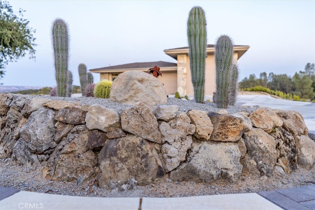 76346 Bryson Hesperia Road Bradley, CA 93426 - Photo 52 of 58 a bed sitting in a bedroom next to a larger window