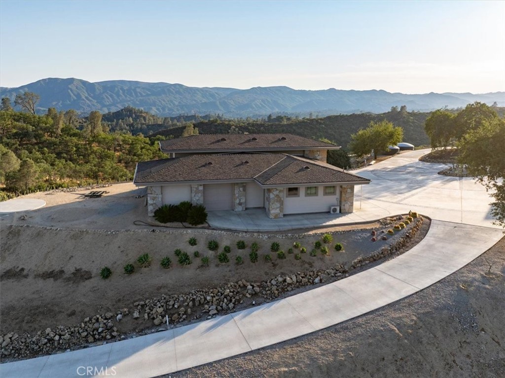 76346 Bryson Hesperia Road Bradley, CA 93426 - Photo 57 of 58 a view of a house with a mountain in the background